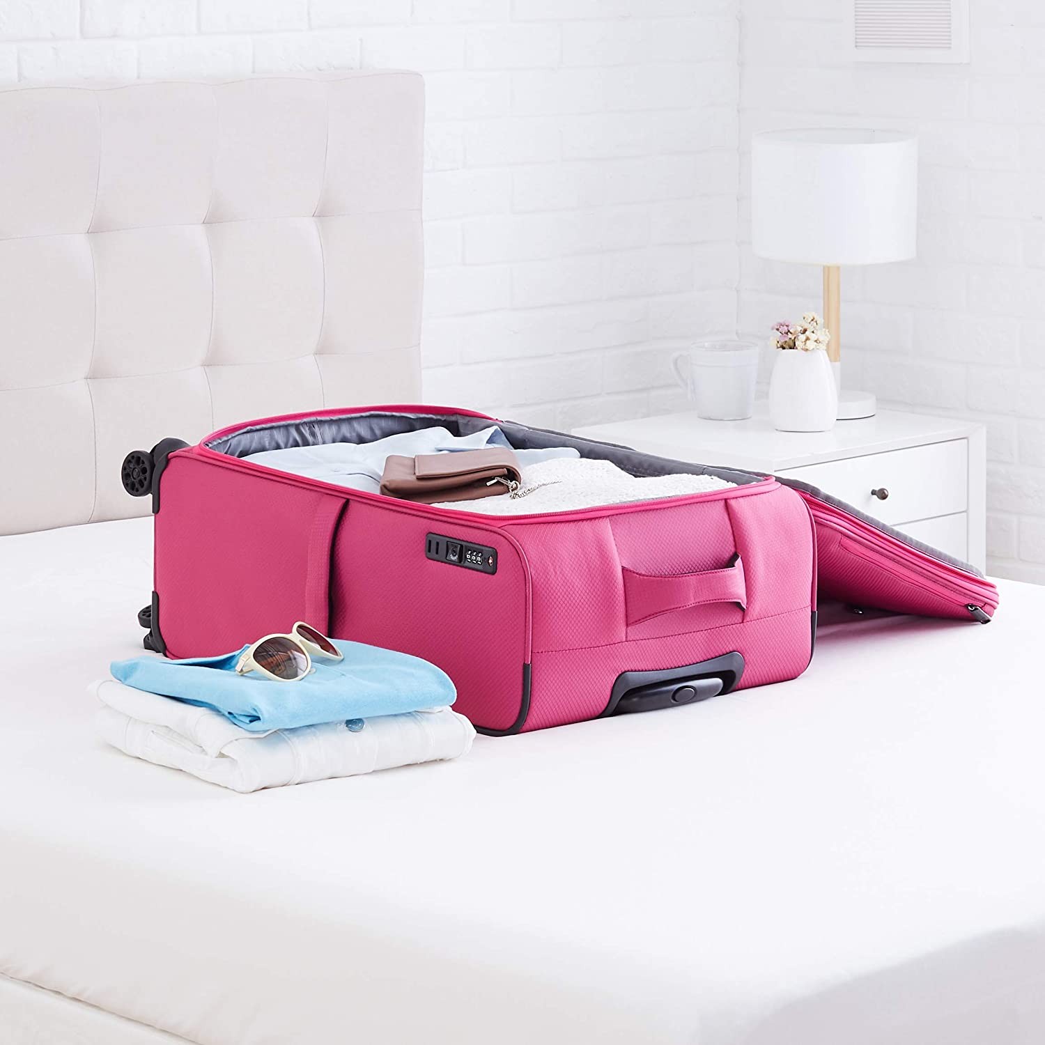Amazon Basics Lightweight Luggage, Softside Spinner Travel Suitcase with Wheels - 27 Inch, Pink